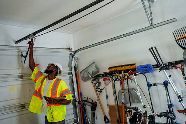 Professional Garage Door Spring Repair technician working in Haubstadt, IN